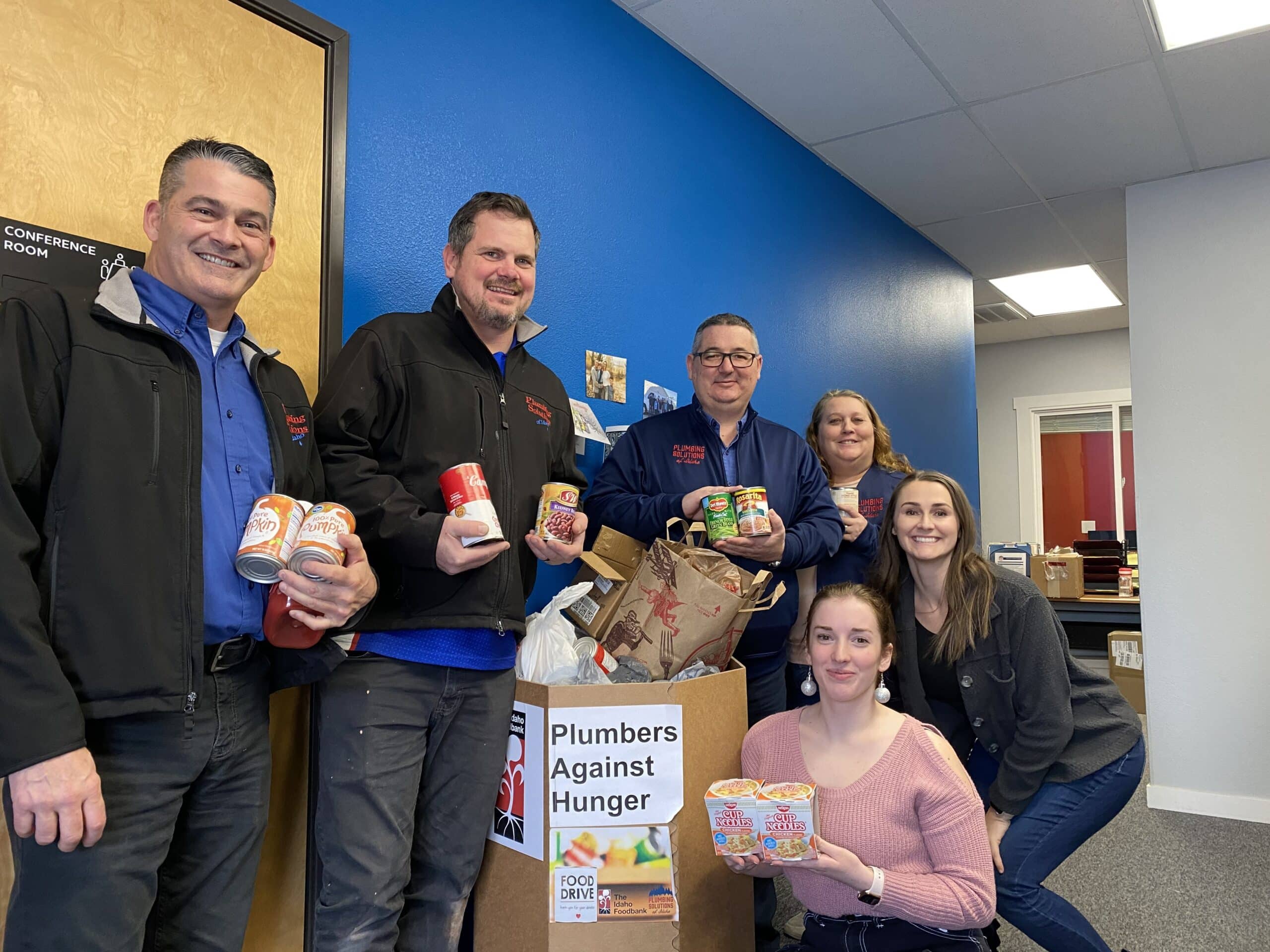 participating in the “Plumber’s Against Hunger” Food Drive